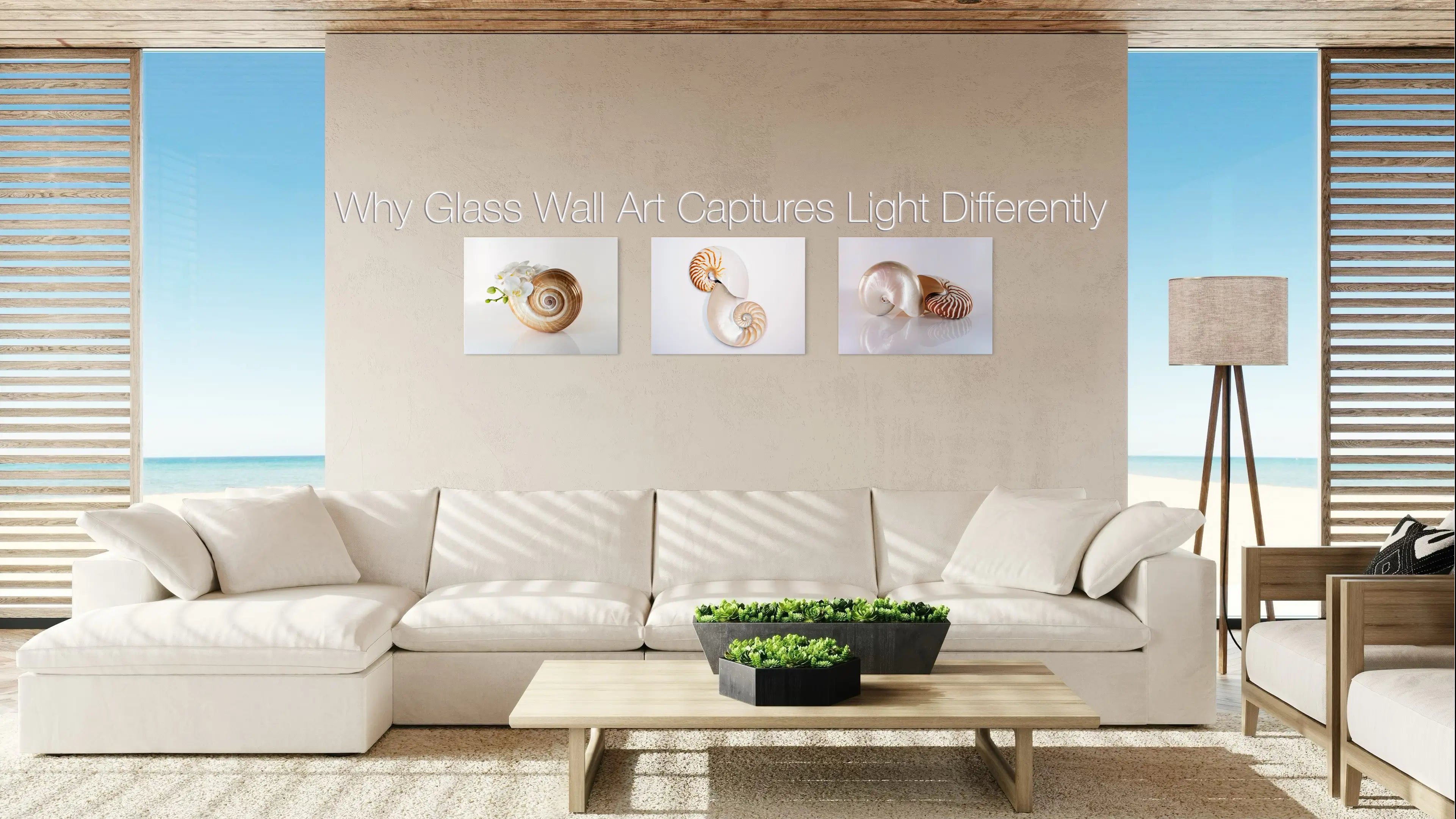 Frameless coastal glass wall art displayed in a light-filled living room with ocean view