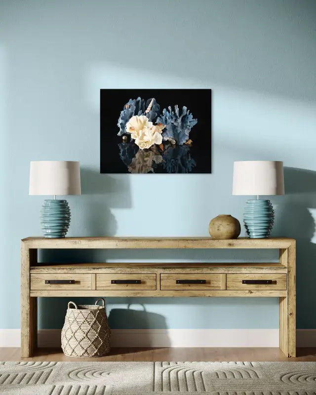Blue Coral & Seashell Glass Print with seashells and Poca coral on reflective black background for coastal wall decor.