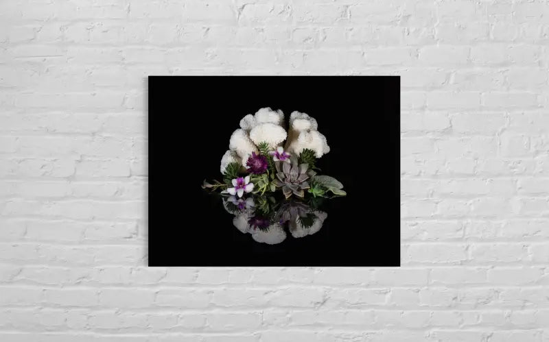 A glass print of cauliflower coral and succulents on black background-wall decor.