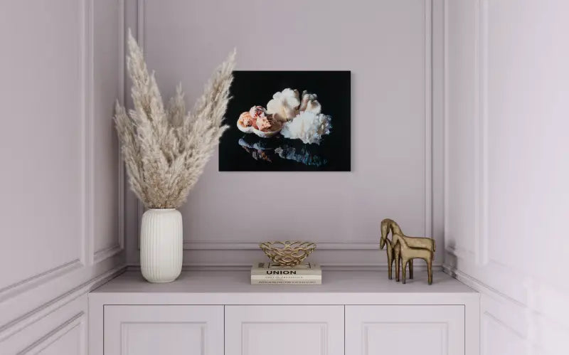 Coastal decor print glass art with coral bowl, shells, and lettuce coral on black background-corner niche