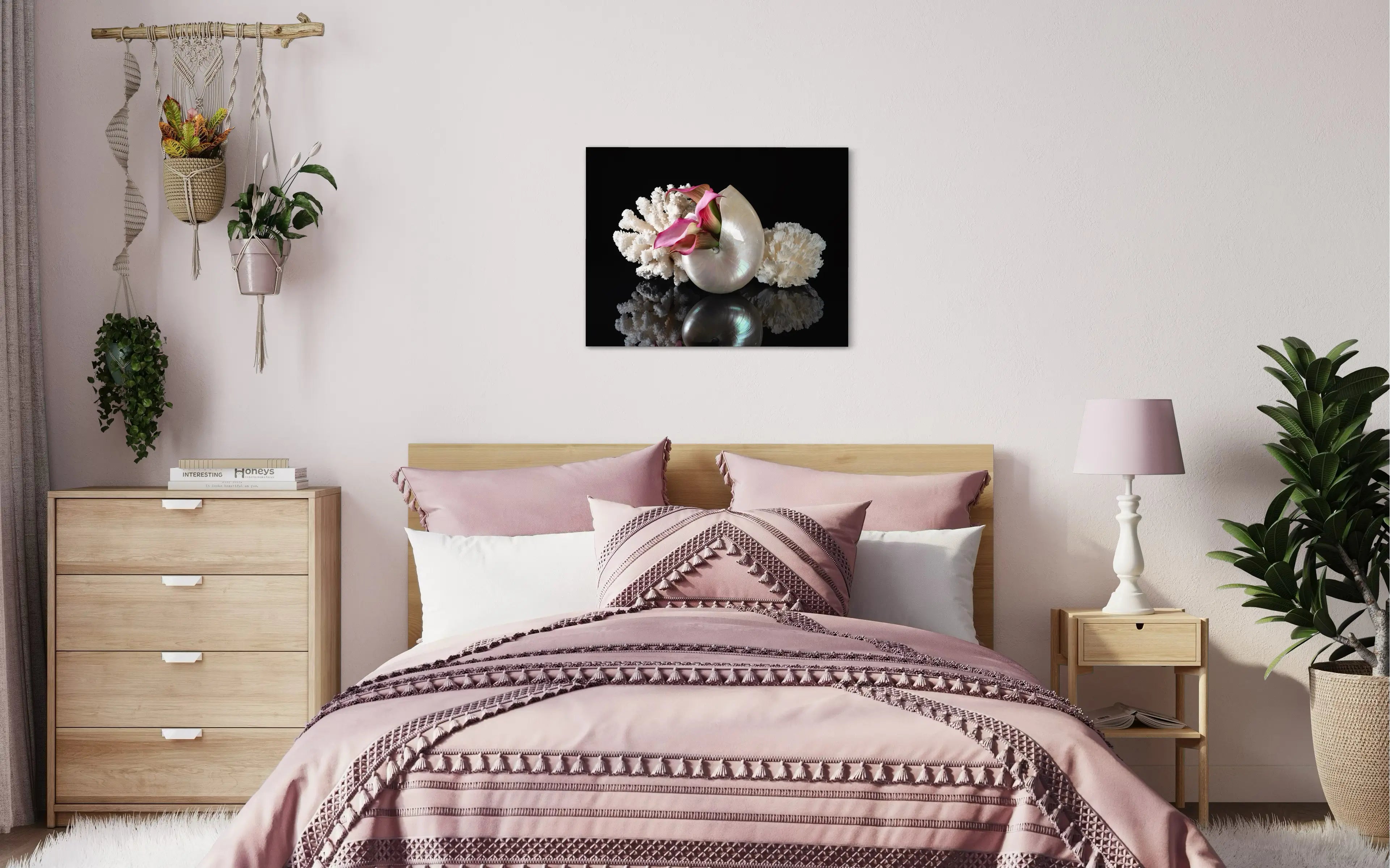 Coastal glass print of a pearl nautilus, coral and pink lilies on black reflective background for ocean bedroom wall art.