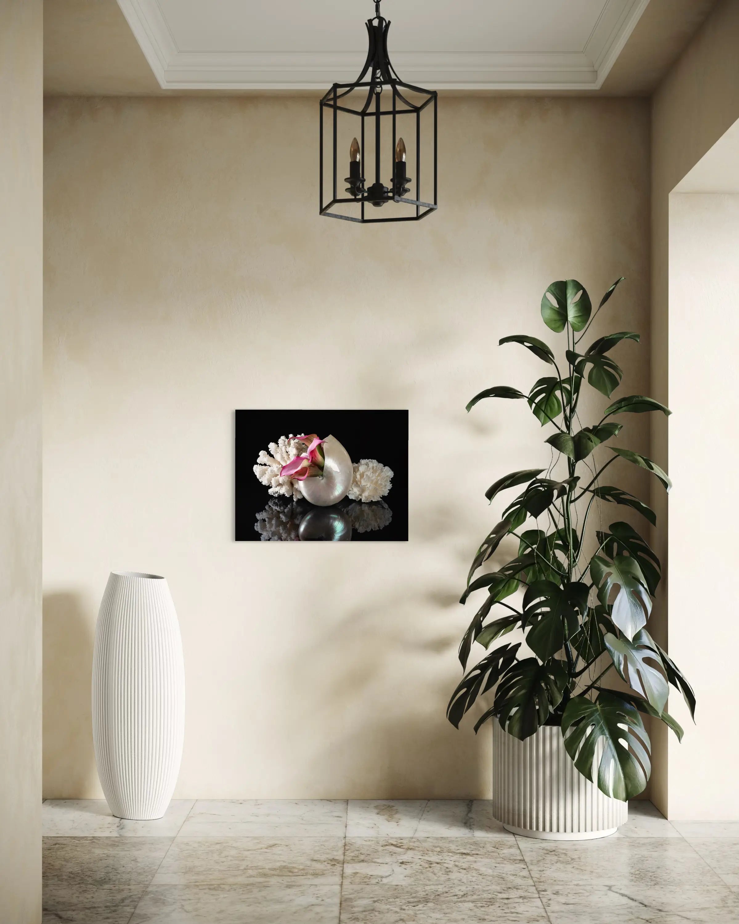 Coastal glass print of a pearl nautilus, coral and pink lilies on black reflective background for ocean hallway wall art.