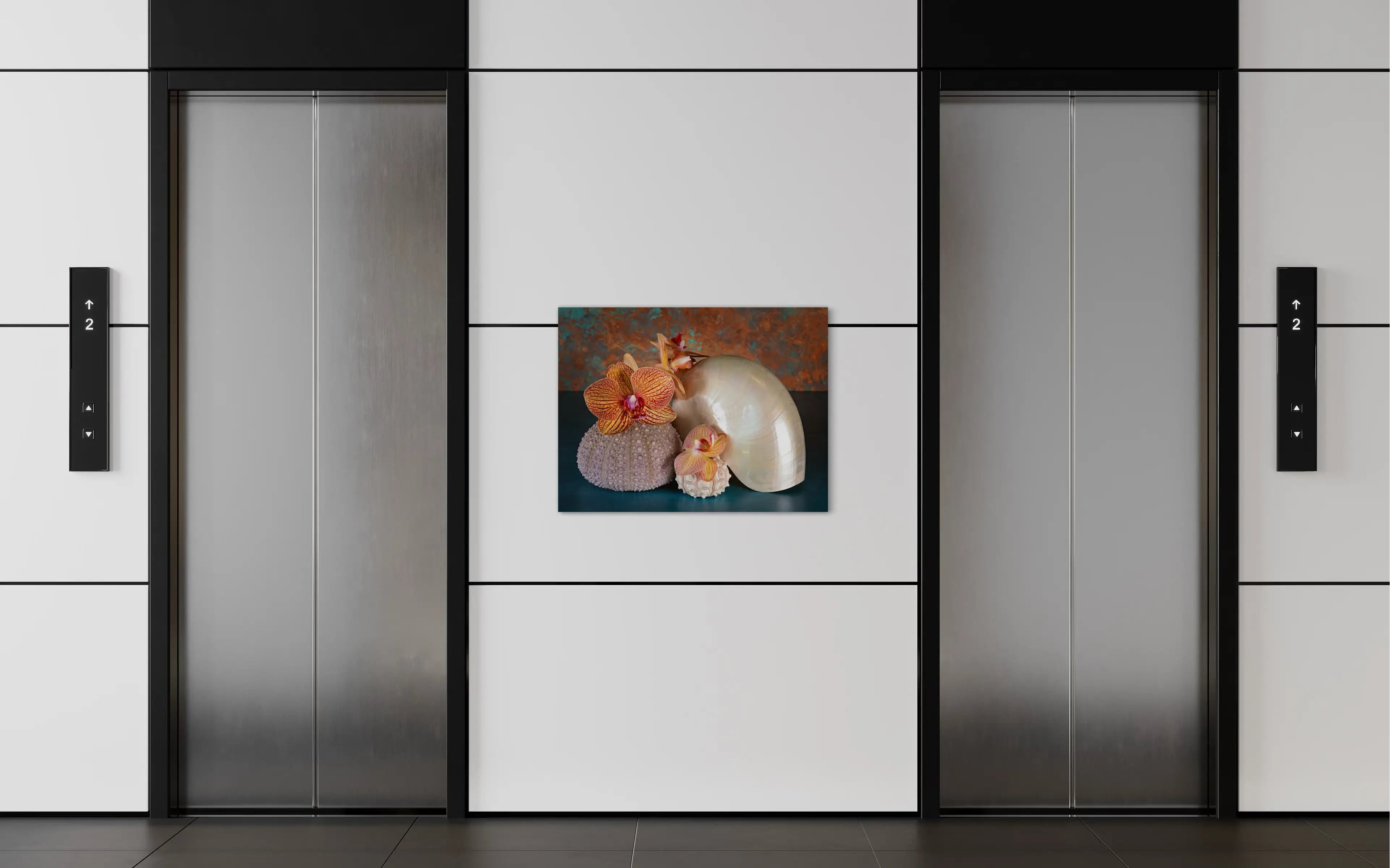 Glass print of orchids, pearl nautilus and sea urchins outside a hotel elevator.