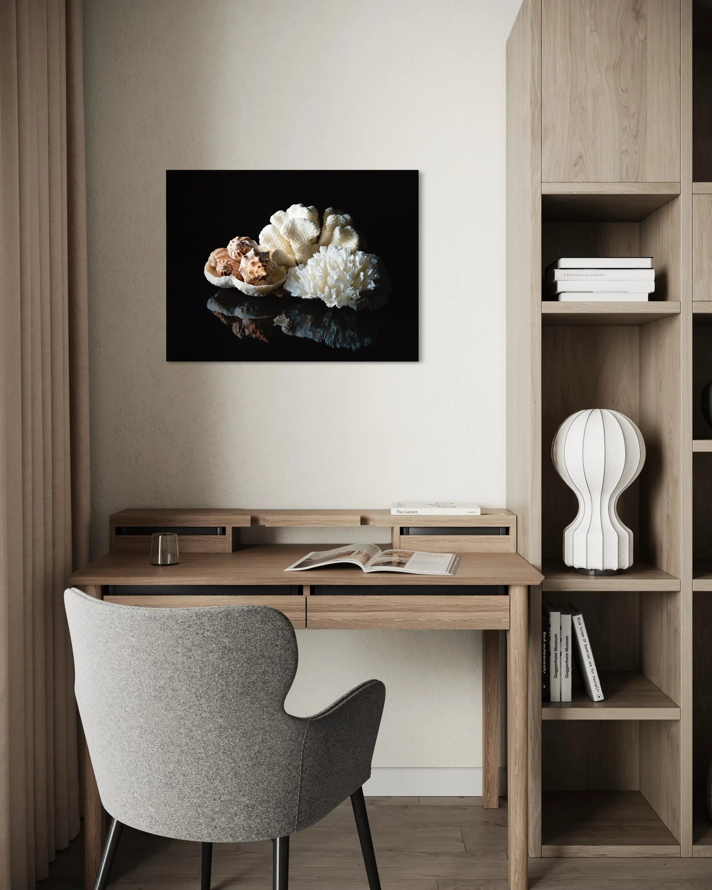 Coral bowl and seashells on reflective black glass, coastal art office decor