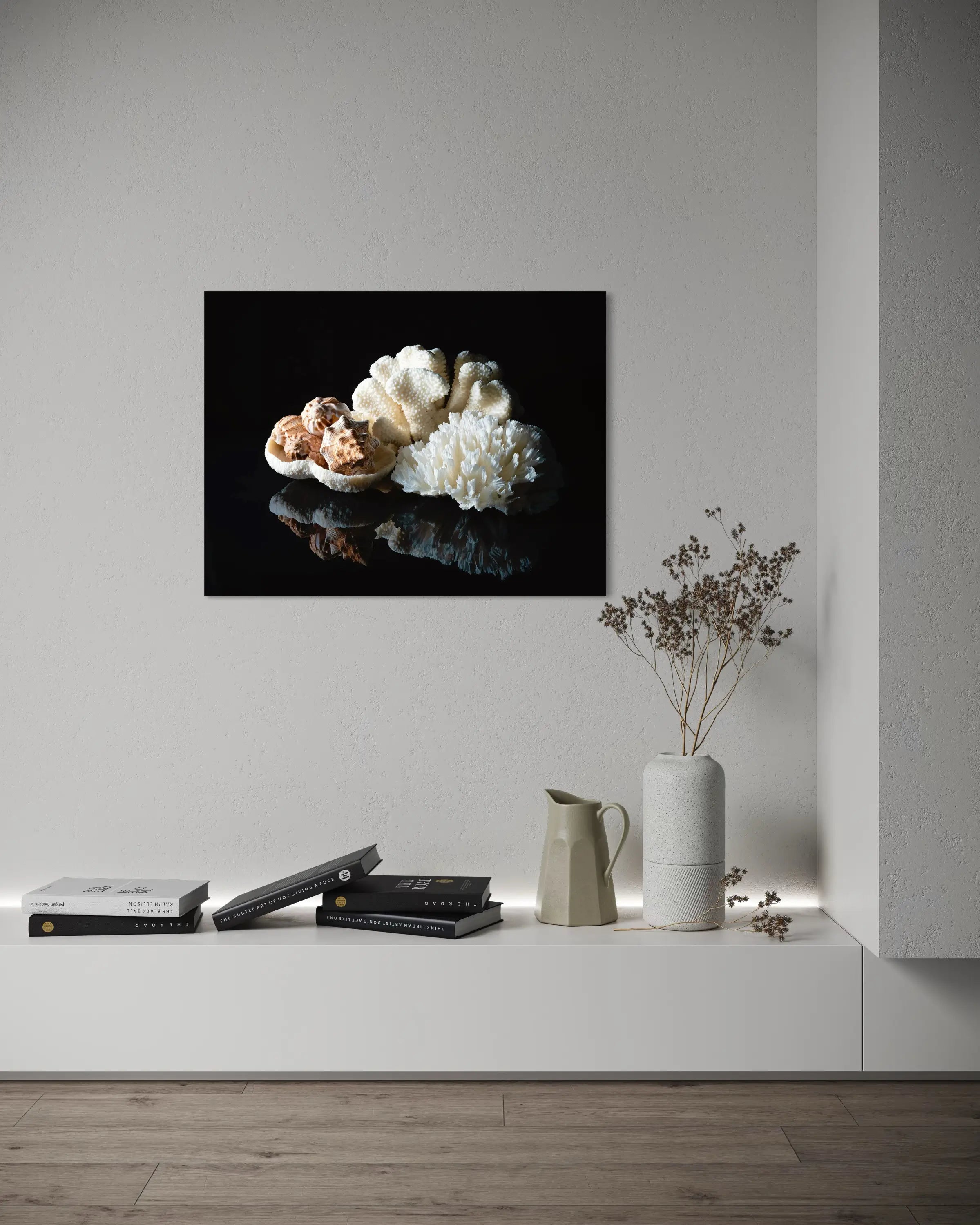 Coral bowl and seashells on reflective black glass, coastal art, coastal niche decor