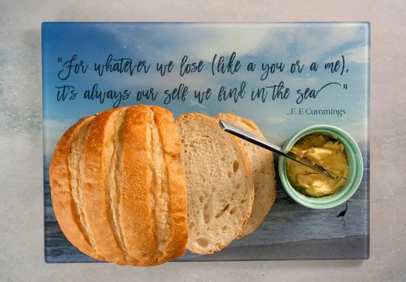 Glass charcuterie board with coastal heron design and inspirational quote-in use