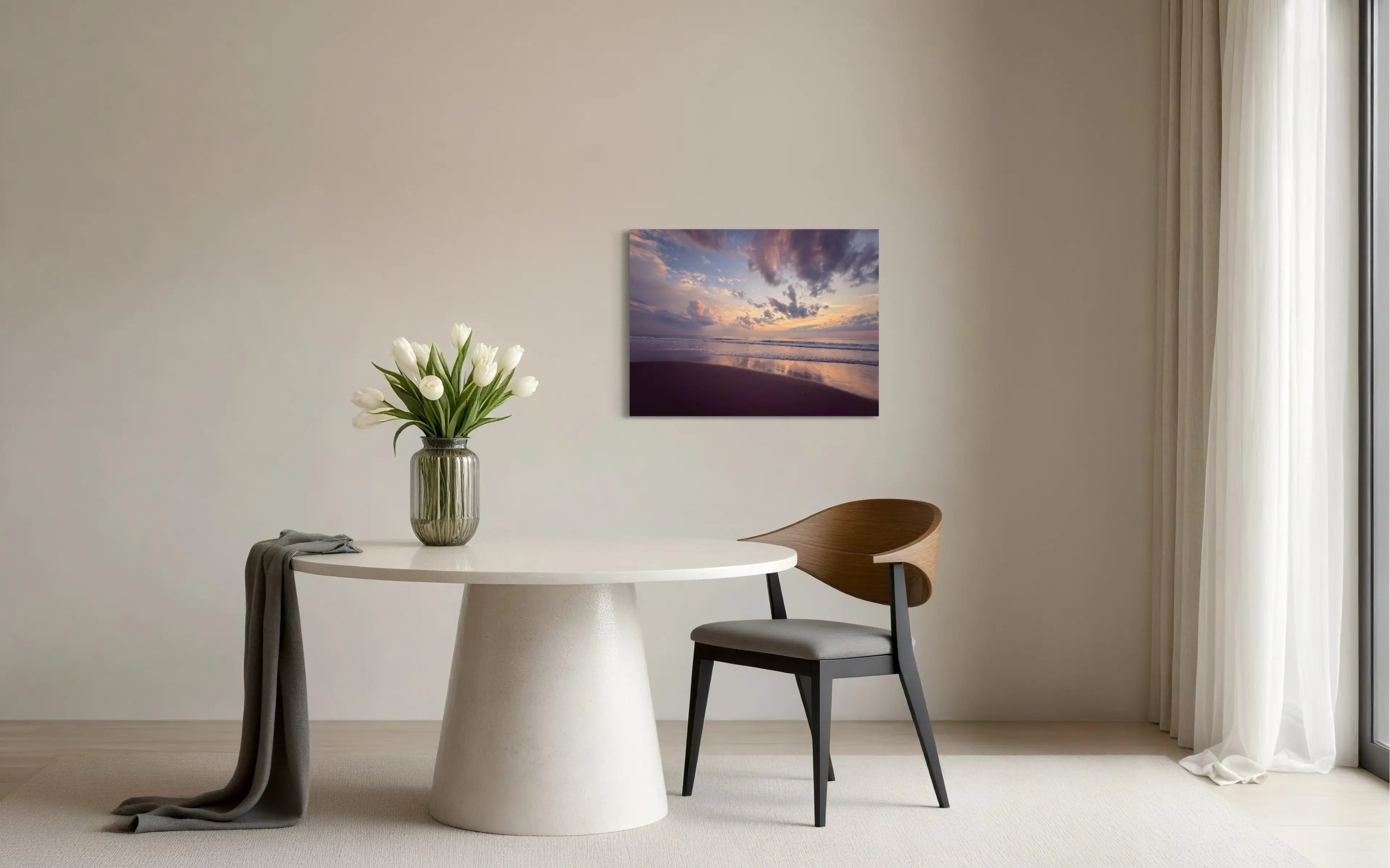 Vibrant coastal glass print featuring a sunrise on Corolla Beach in the Outer Banks, with the sun's colors reflecting on the wet sand, coastal dining room