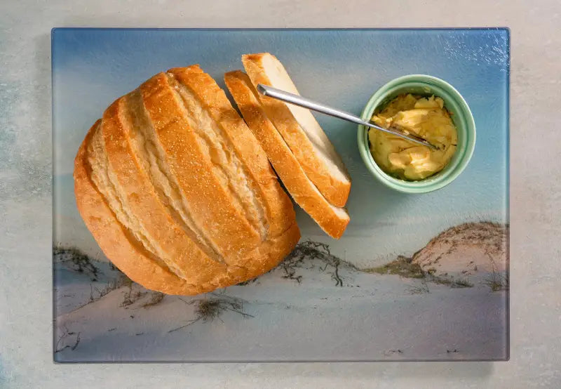 Glass charcuterie board with driftwood dunes and coastal design-in use