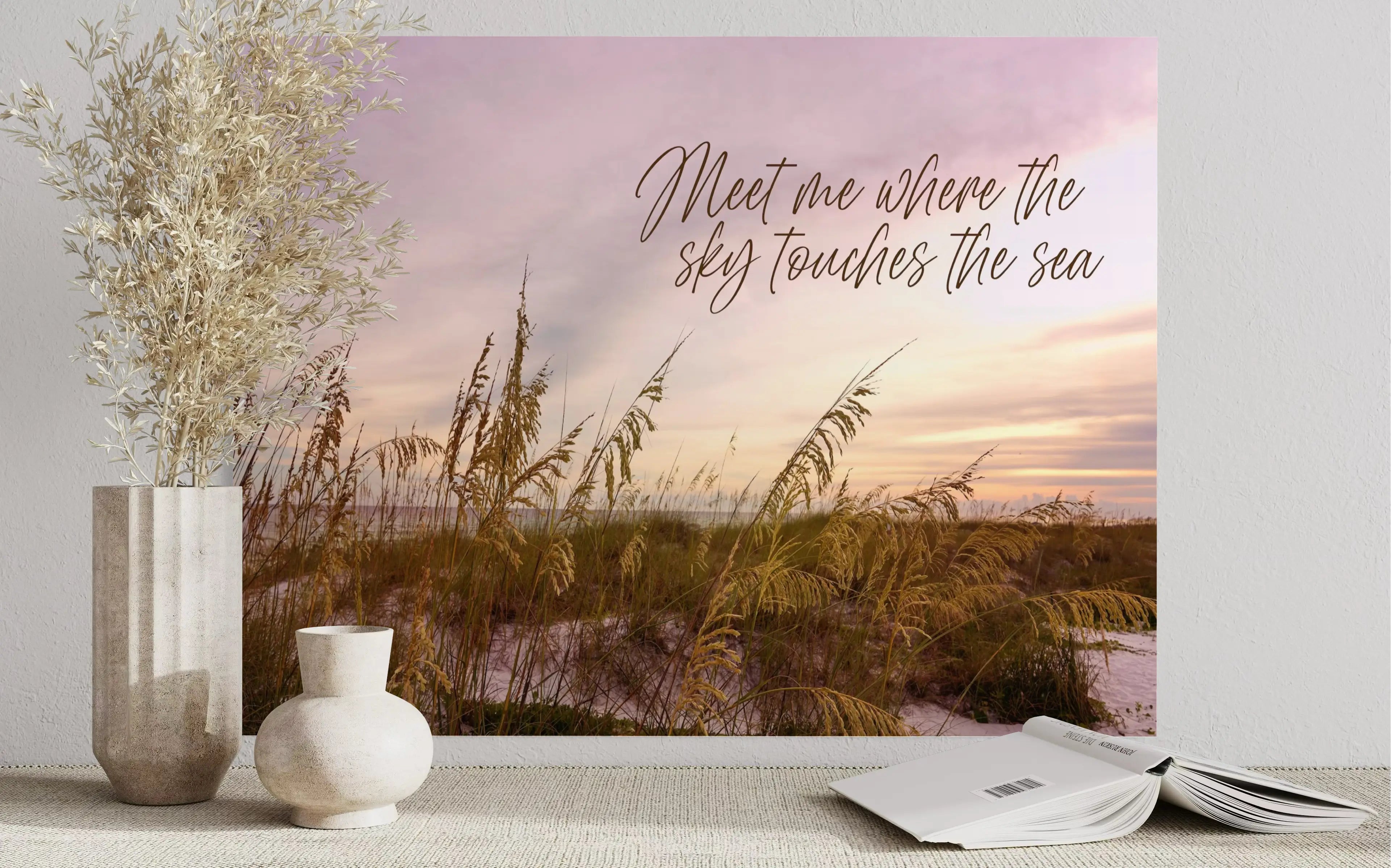 Coastal Sunset Glass Print: Dusk’s Serenity, sea oats swaying at sunset with 'Meet me where sky touches sea,' above a shelf