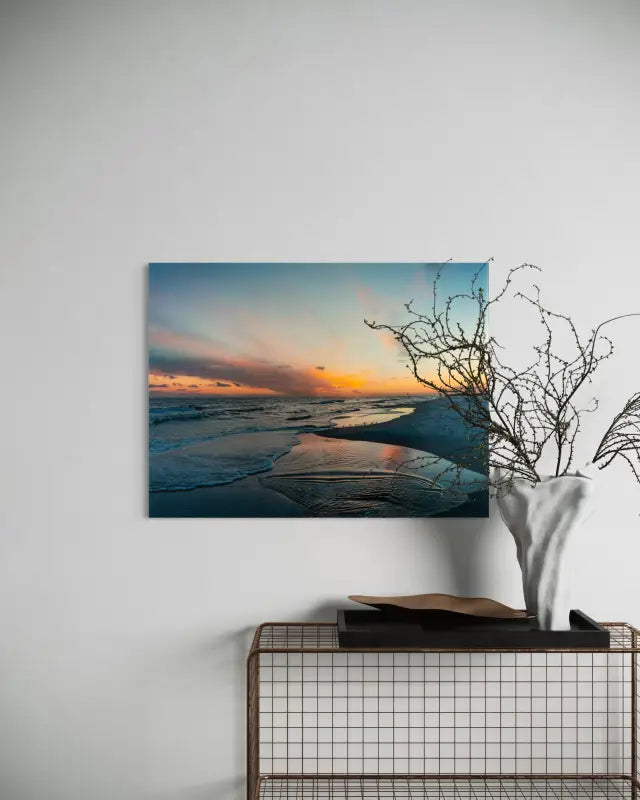 Gulf Coast sunset glass print with vibrant yellows, oranges, purples, pinks, eco-friendly art for coastal decor above wire frame table