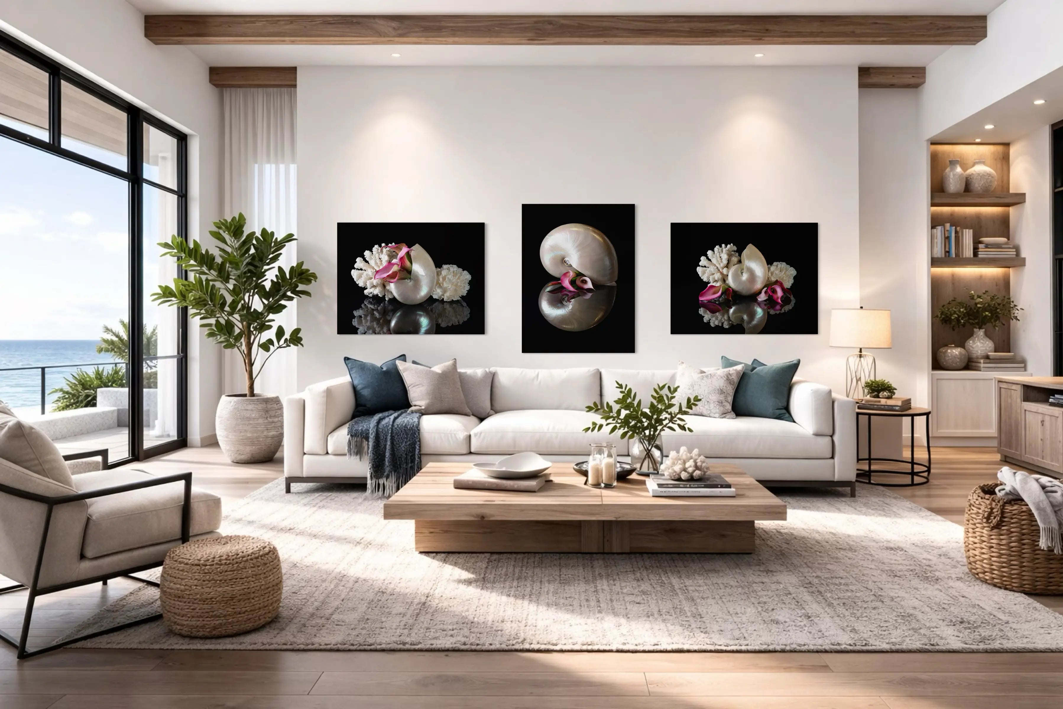 Modern coastal living room with three pearl nautilus and lilies glass prints