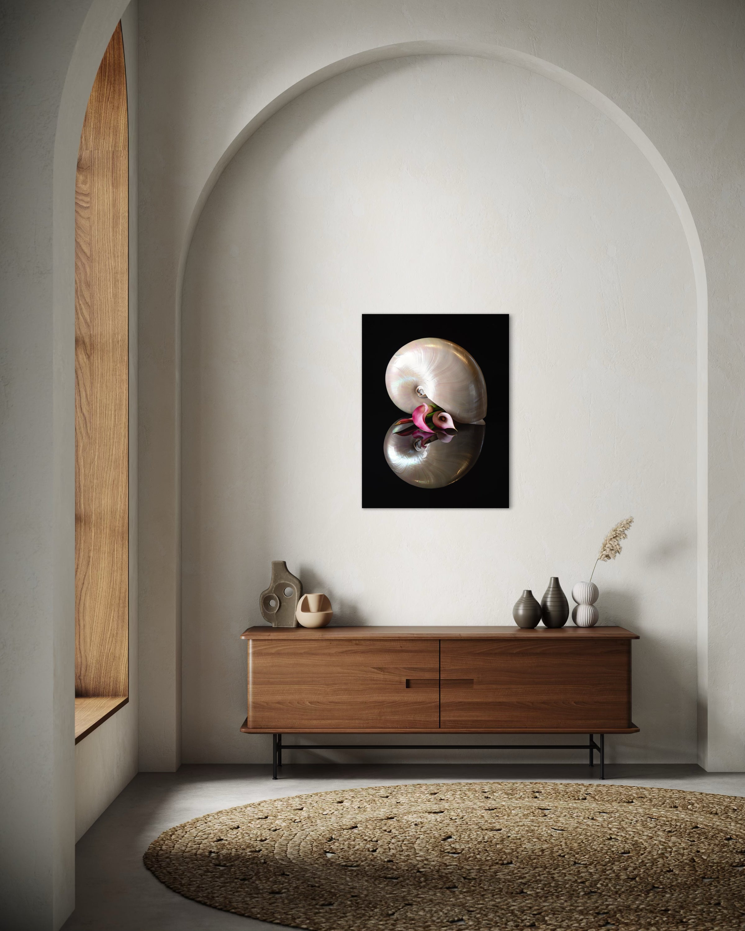 Nautilus shell and pink lilies on reflective glass, coastal wall art