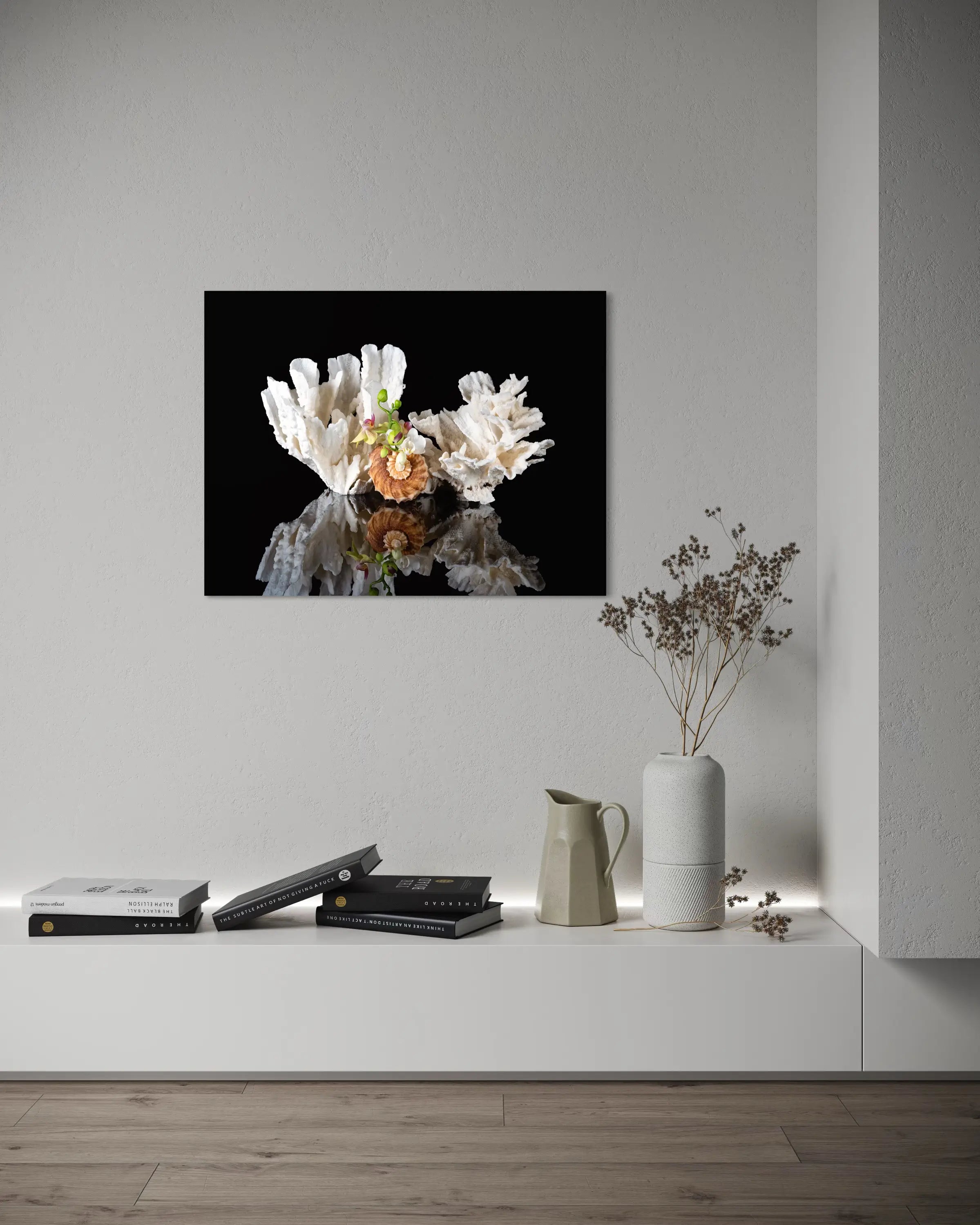 Coastal glass print with triton shell, lettuce coral, and orchids on black background-Ocean wall art.