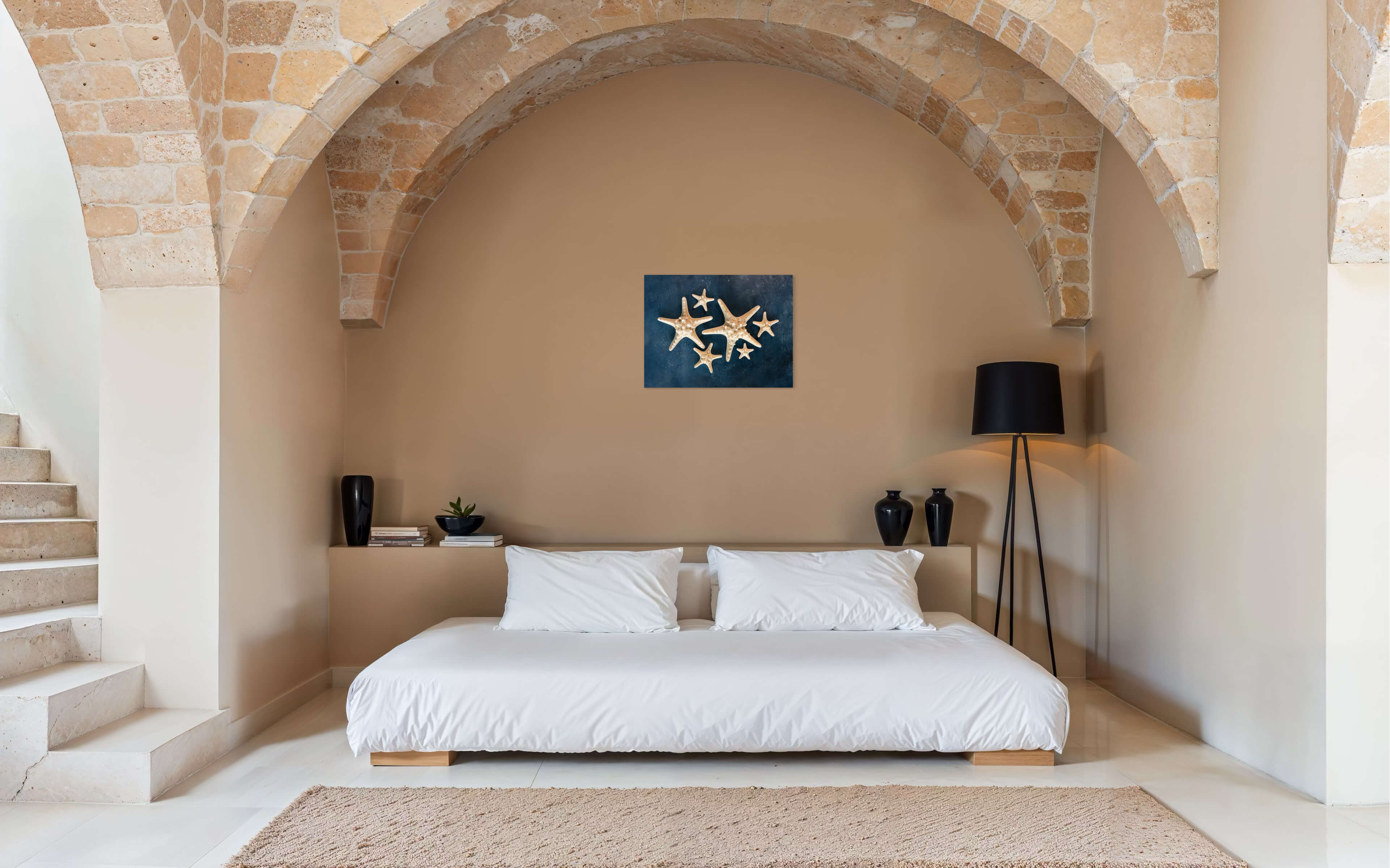 Knobby starfish on blue backdrop, Echoes of the Sea glass print, perfect for coastal bedroom decor.