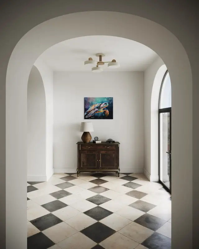 Glass print of a sea turtle swimming underwater with colorful water color effect displayed in entryway.