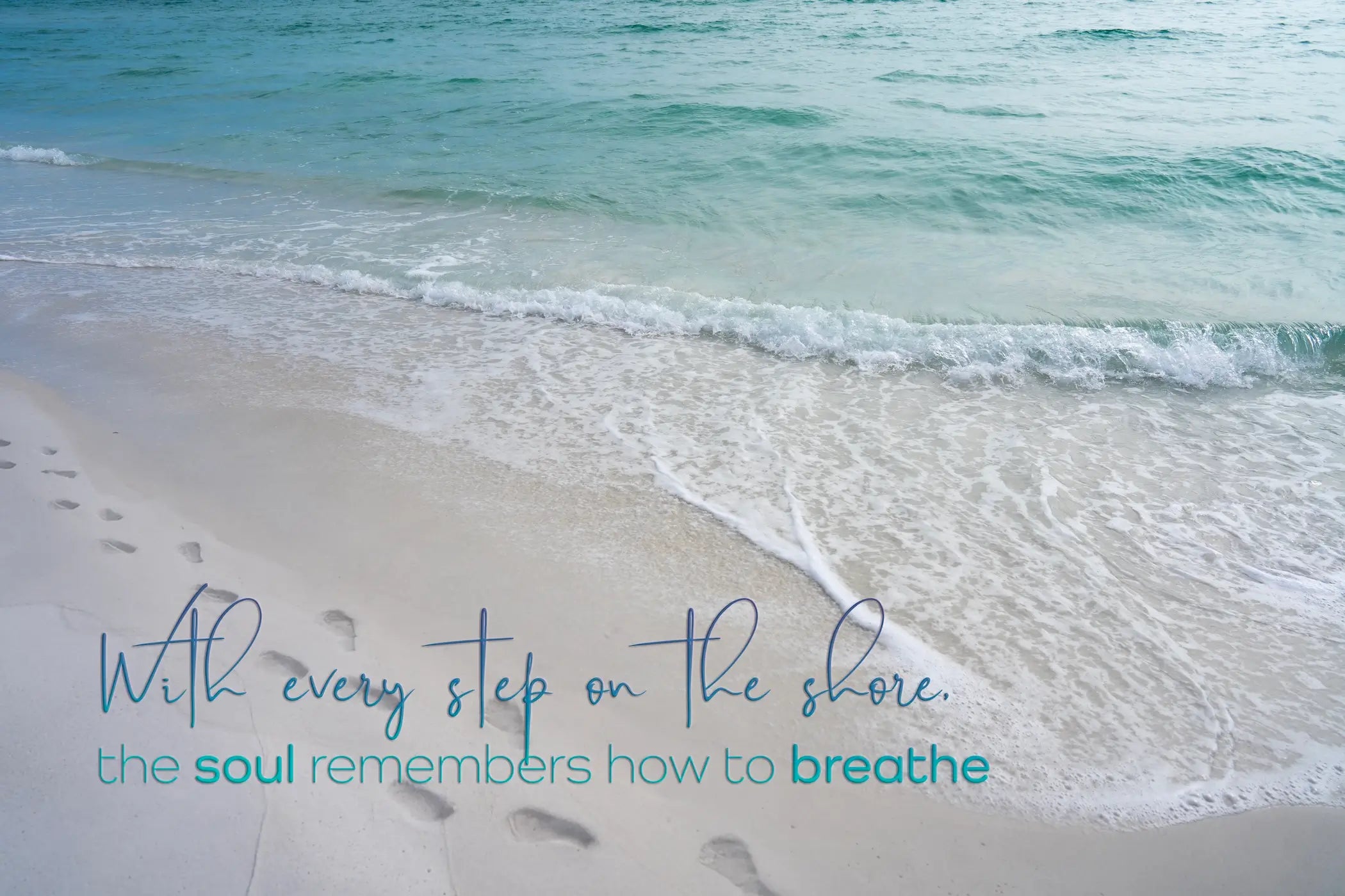 Coastal glass print with beach footprints and ocean waves. Quote reads: “With every step on the shore, the soul remembers how to breathe.” Inspirational ocean wall art.