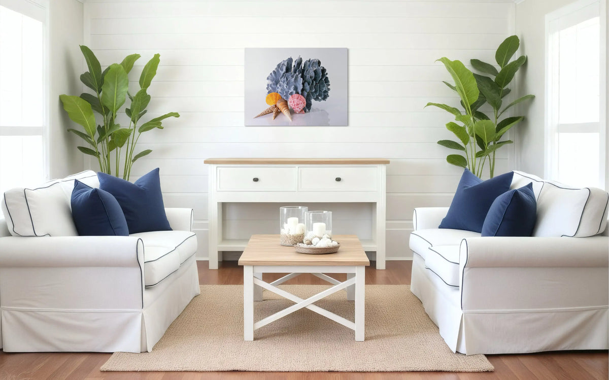 Classic Coastal living room styled with seashell glass wall art print