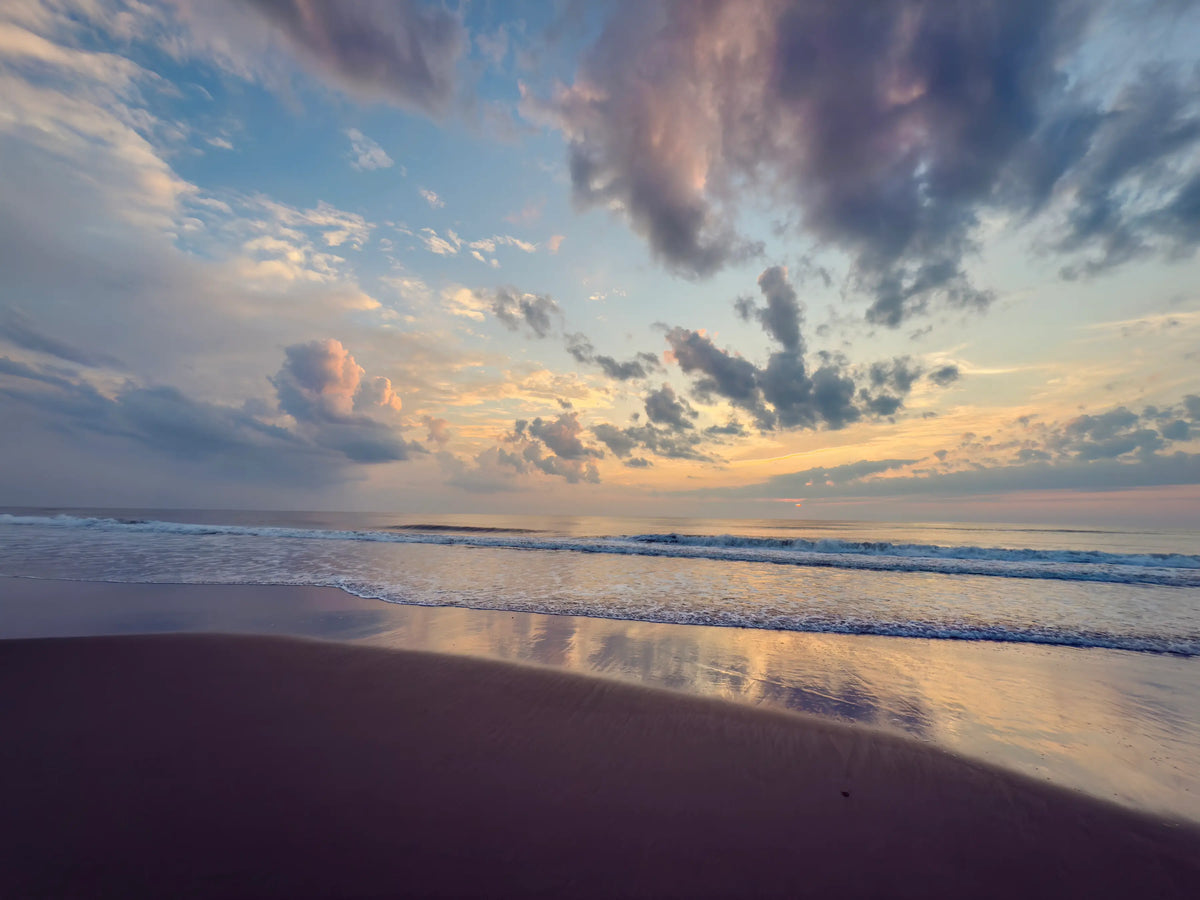 Sunrise on Corolla Beach in soft blues, purples and yellows