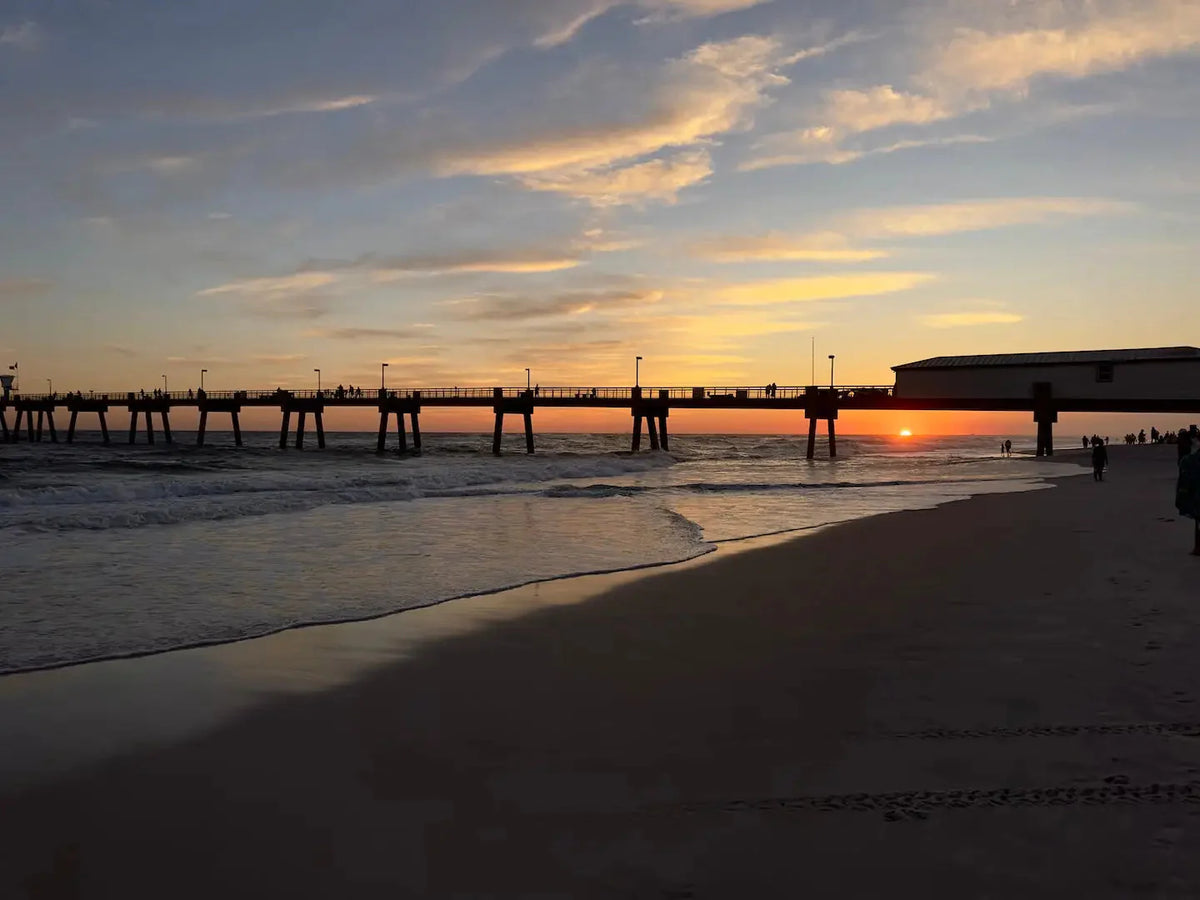 Echoes of the Sea photo of a sun setting under a Gulf Coast pier