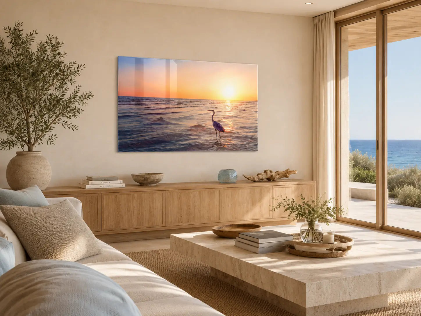 Warm coastal living room in neutrals and natural textures with a heron glass print