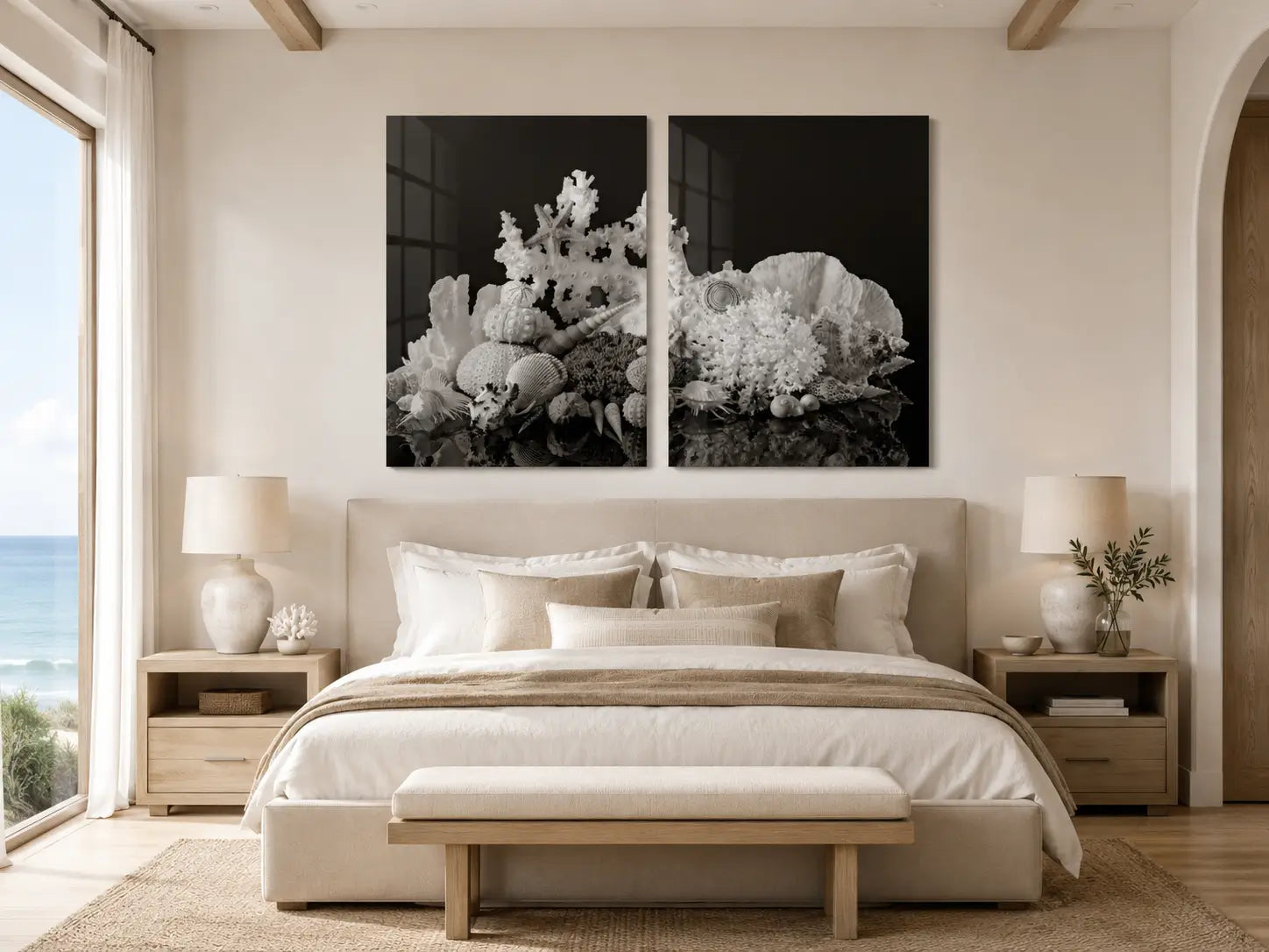 Black and white coral diptych glass wall art displayed above a neutral coastal bed in a bright modern bedroom.