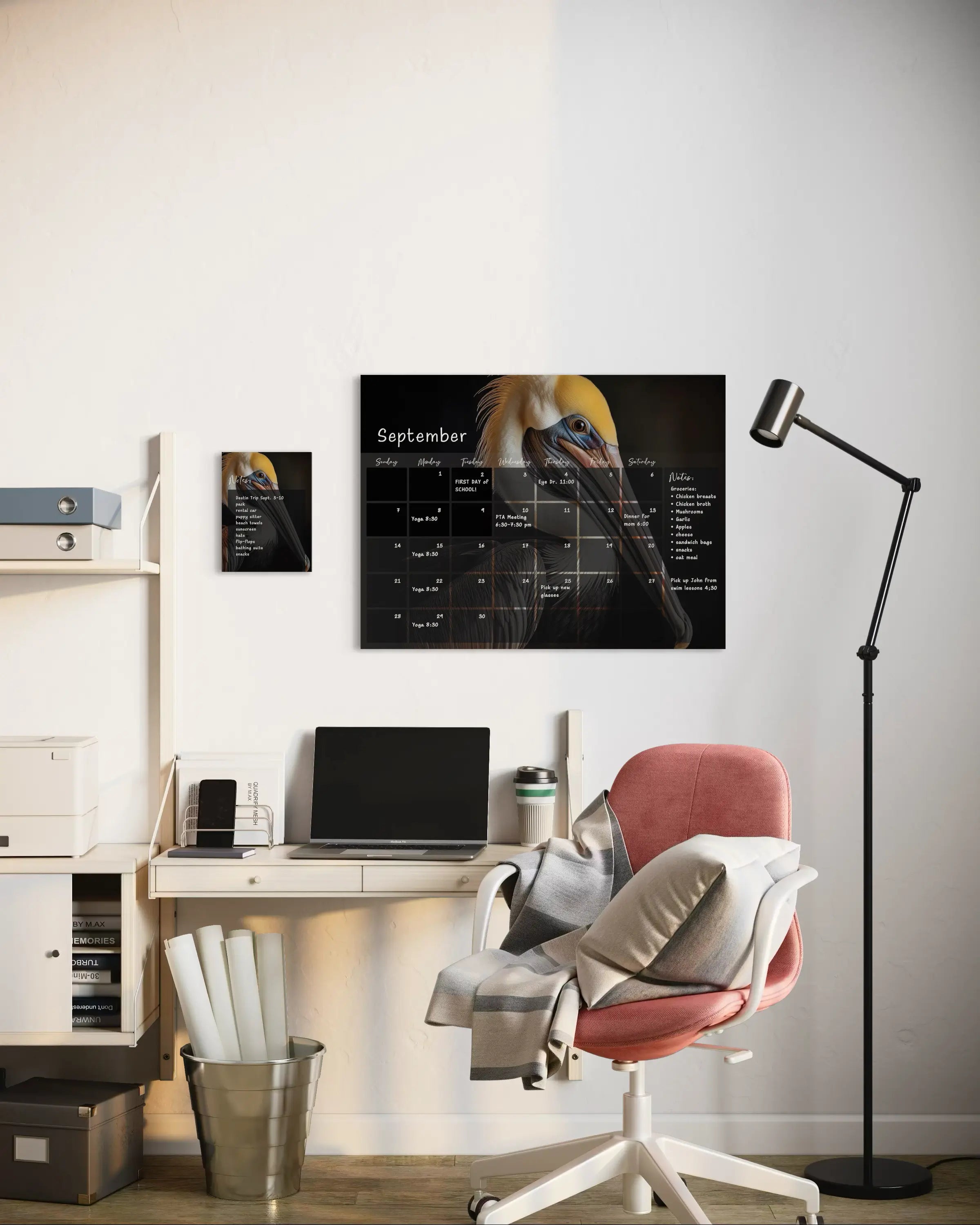 A dry-erase perpetual glass calendar featuring a dramatic portrait of brown pelican on dark background, with monthly grid and a notes section, shown with notes pad