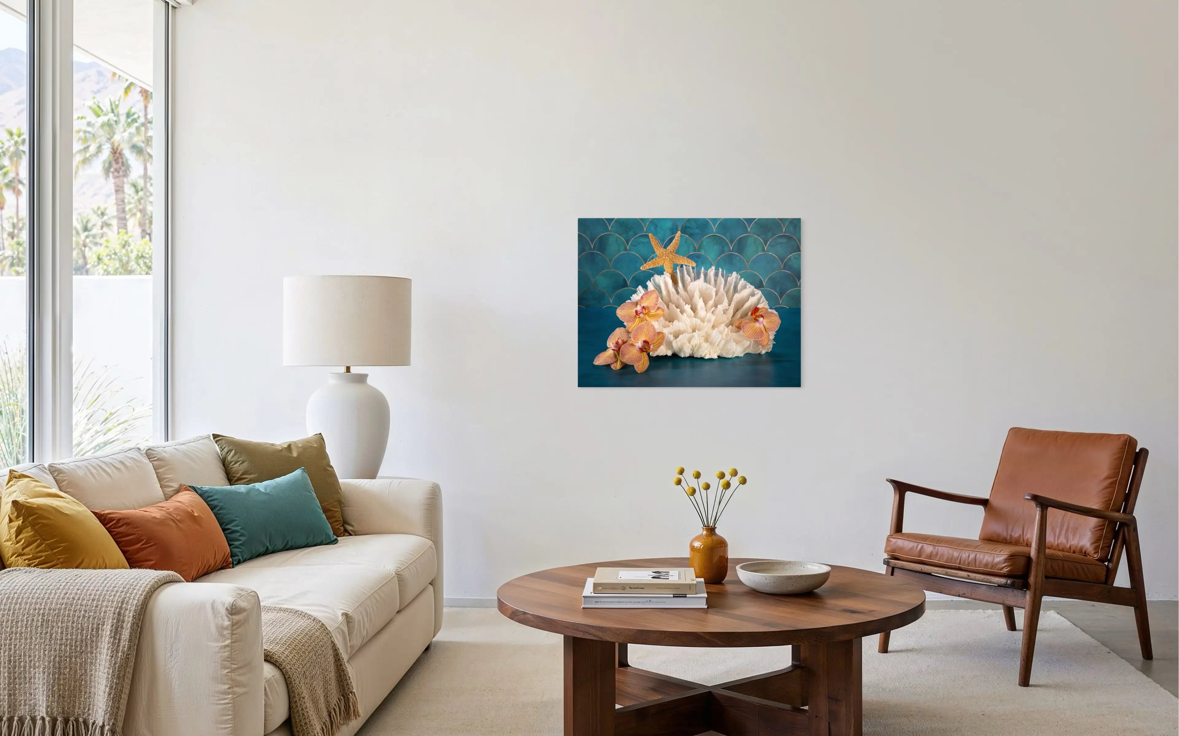 Coastal boho living room with vibrant coral glass print