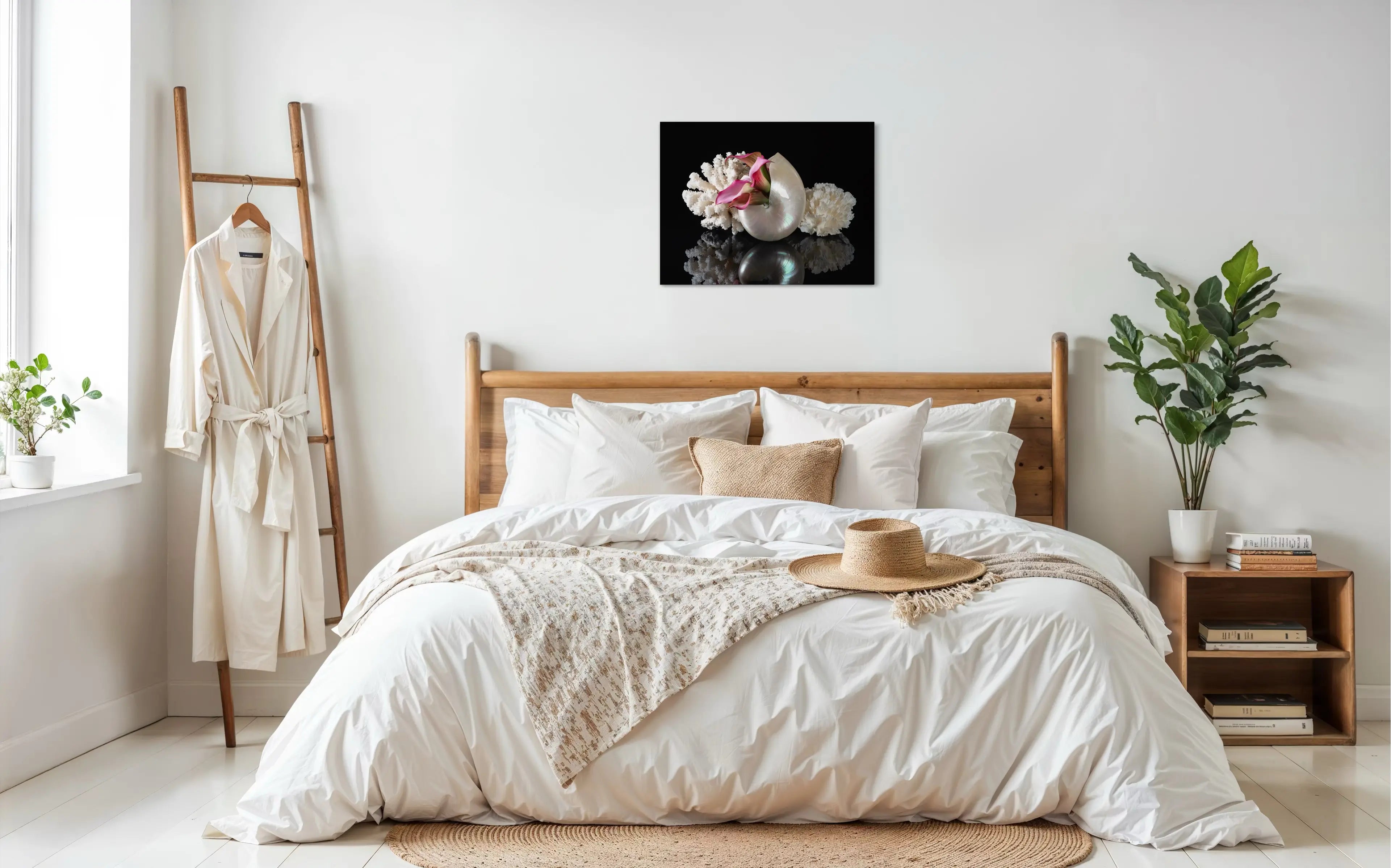 Coastal glass print of a pearl nautilus, coral and pink lilies on black reflective background for ocean bedroom wall art.