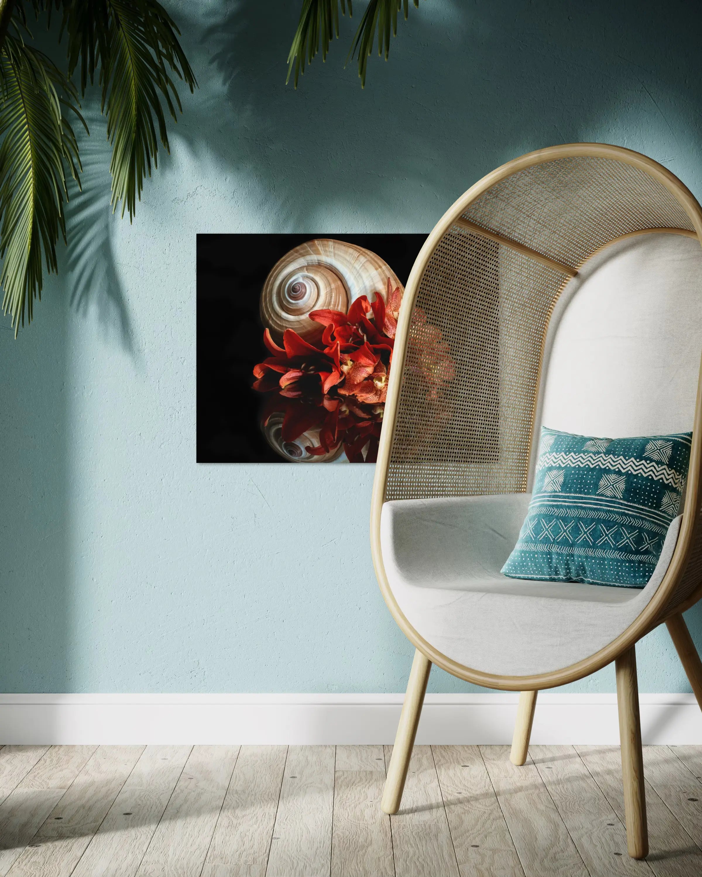 Coastal glass print of a giant ton shell with orange lilies in a tropical sunroom.