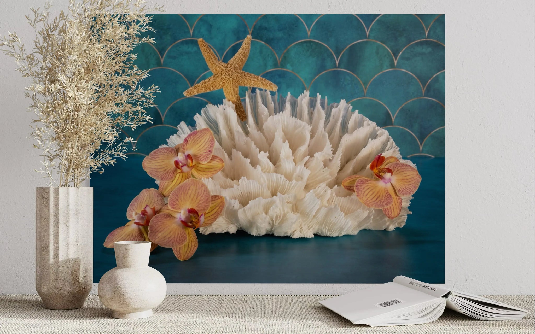 Vibrant tropical glass print of orchids, poca coral and a starfish on a colorful blue background that evokes the sea.