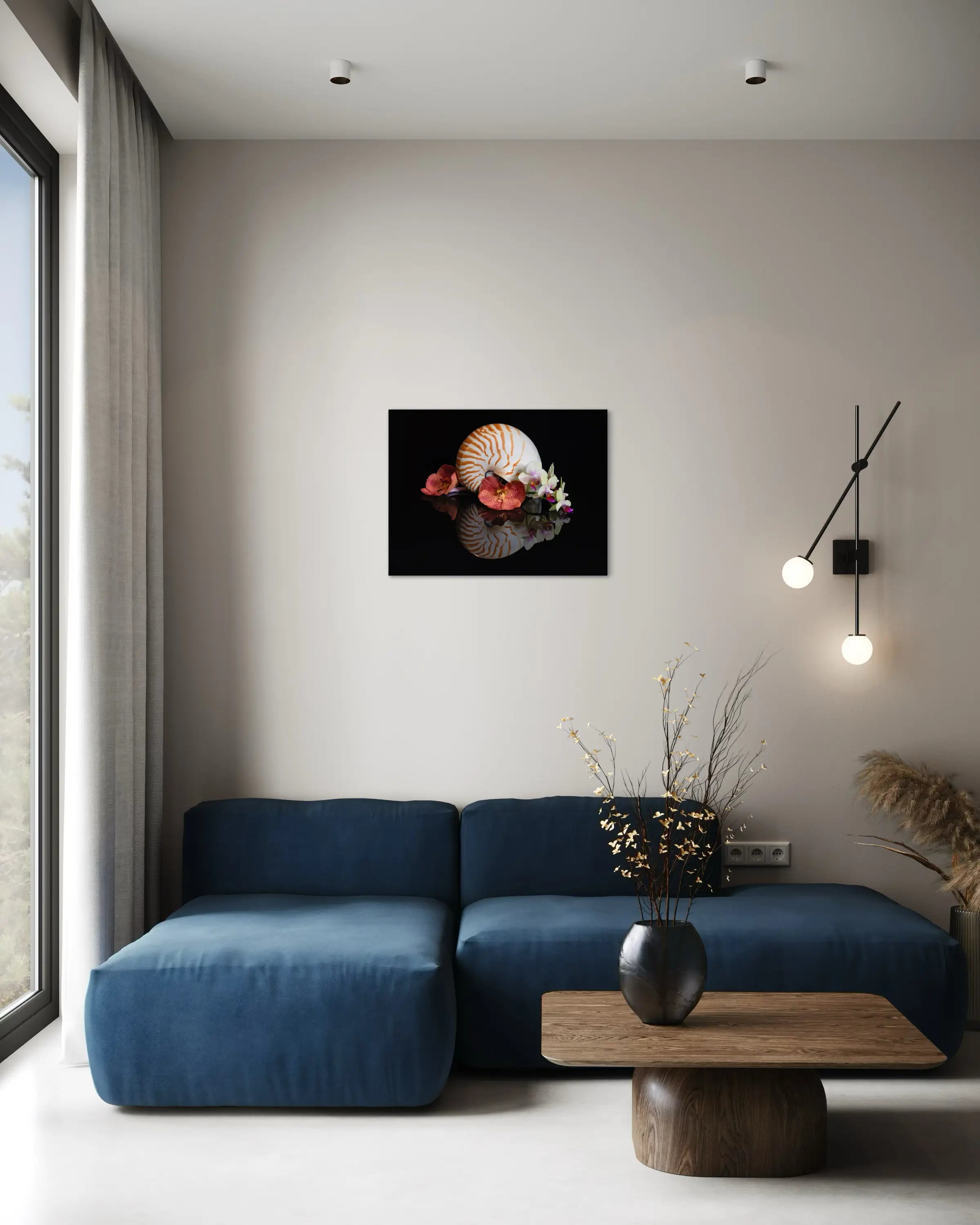 Coastal glass print of a chambered nautilus with deep orange orchids on black reflective surface, living room