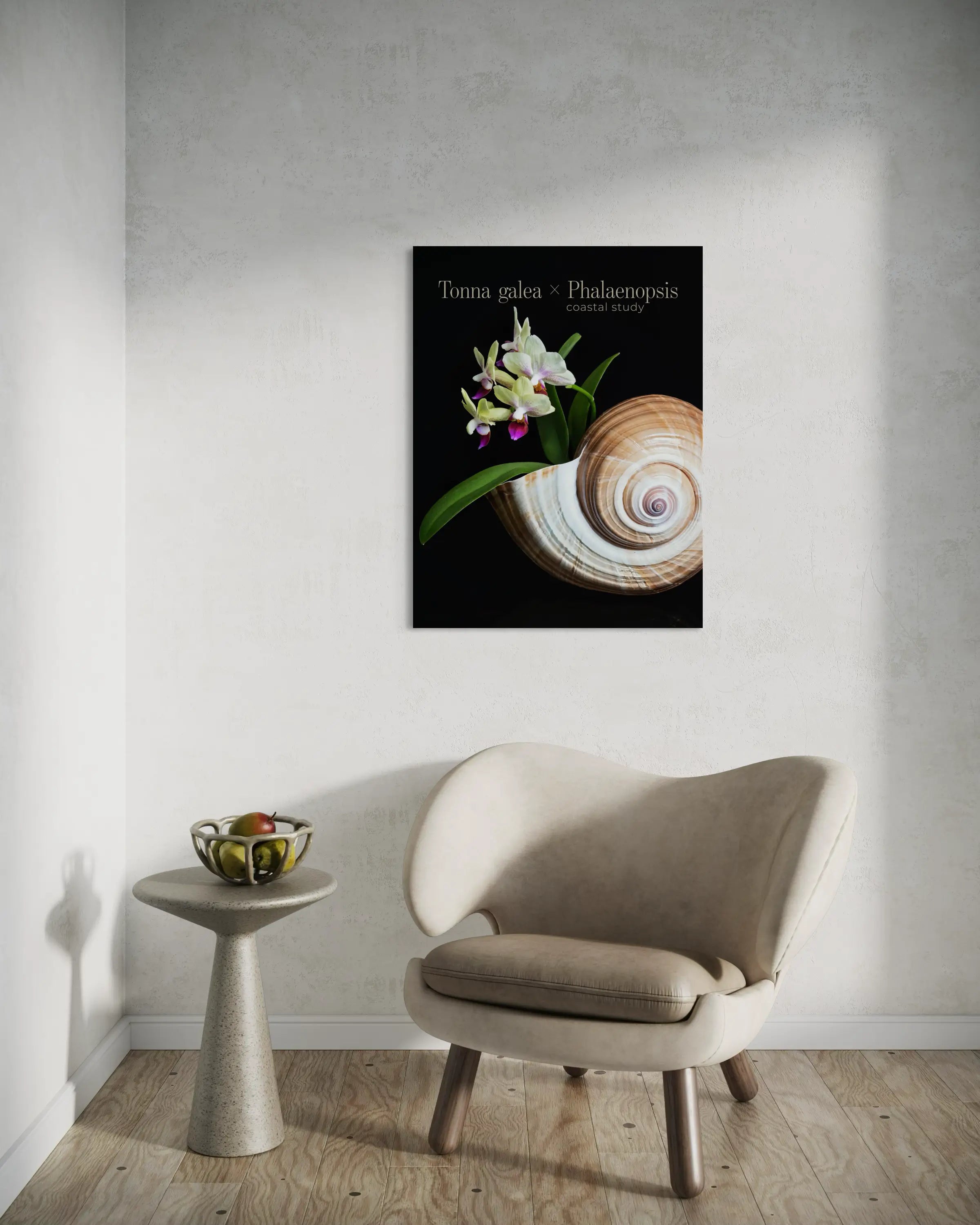Tonna shell and orchid glass wall art displayed above a modern lounge chair in a minimalist neutral interior