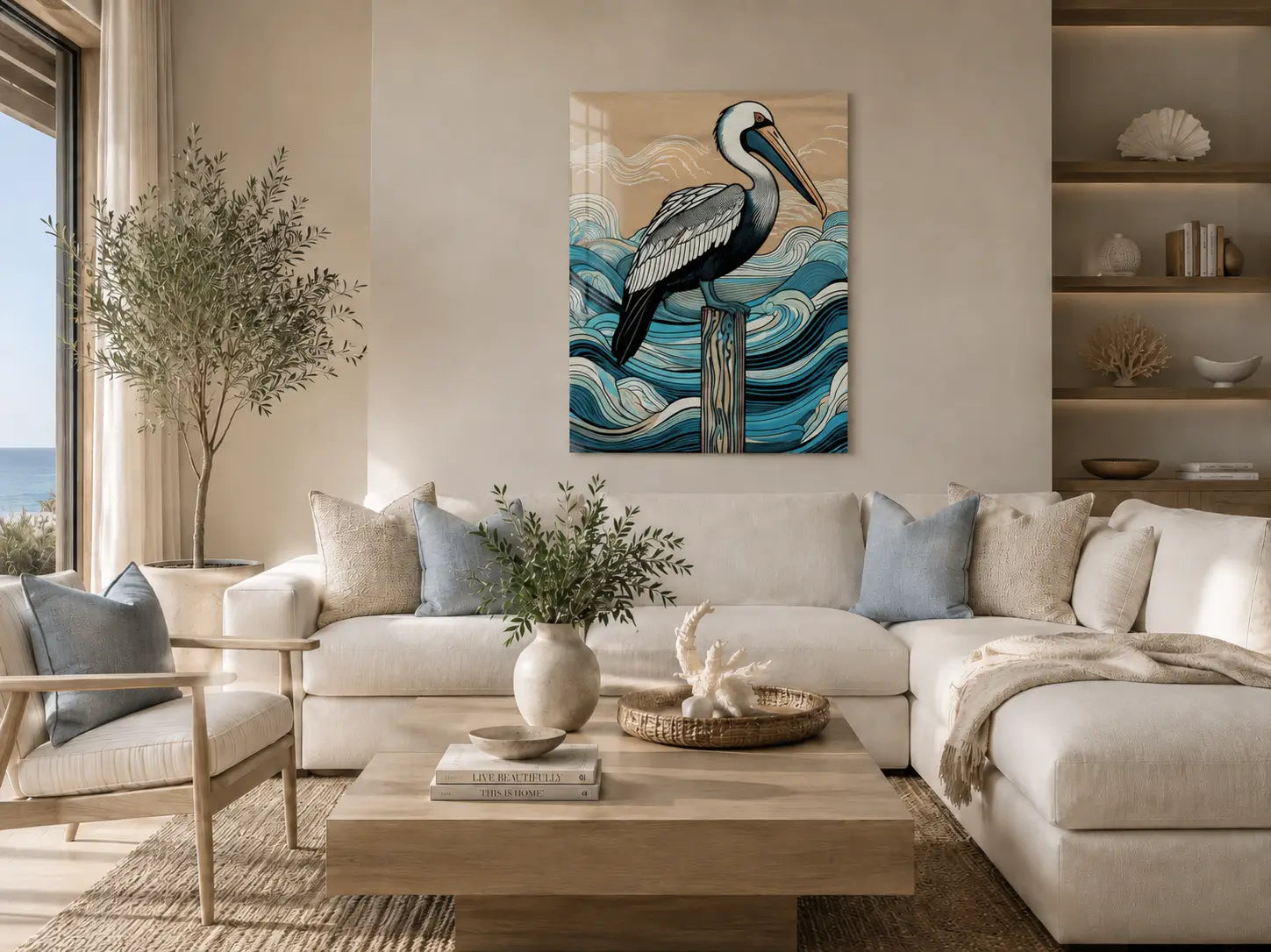 Coastal living room with a white sectional sofa, coffee table, and Hokusa-inspired pelican glass print