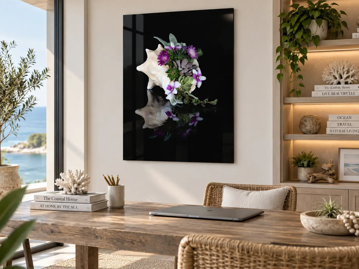Conch Shell Botanical Coastal Wall Art displayed in a serene home office, featuring a conch shell arrangement with succulents and purple flowers on frameless glass.