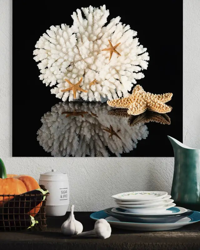 Coastal glass print of white coral and golden starfish on black background - Shell Prints