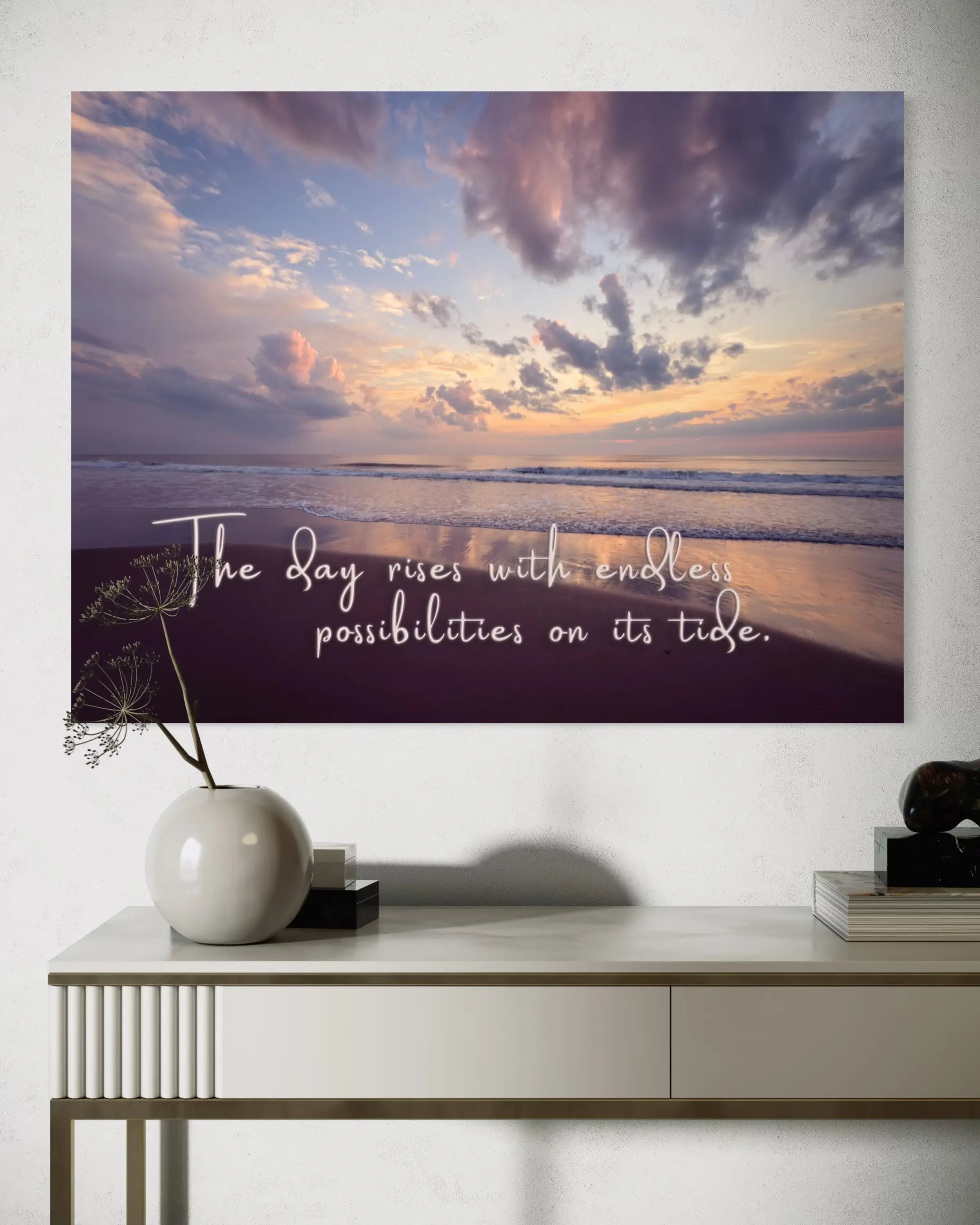Corolla Sunrise Coastal Glass Print with quote displayed above white entryway table – inspirational ocean wall art for coastal interiors.