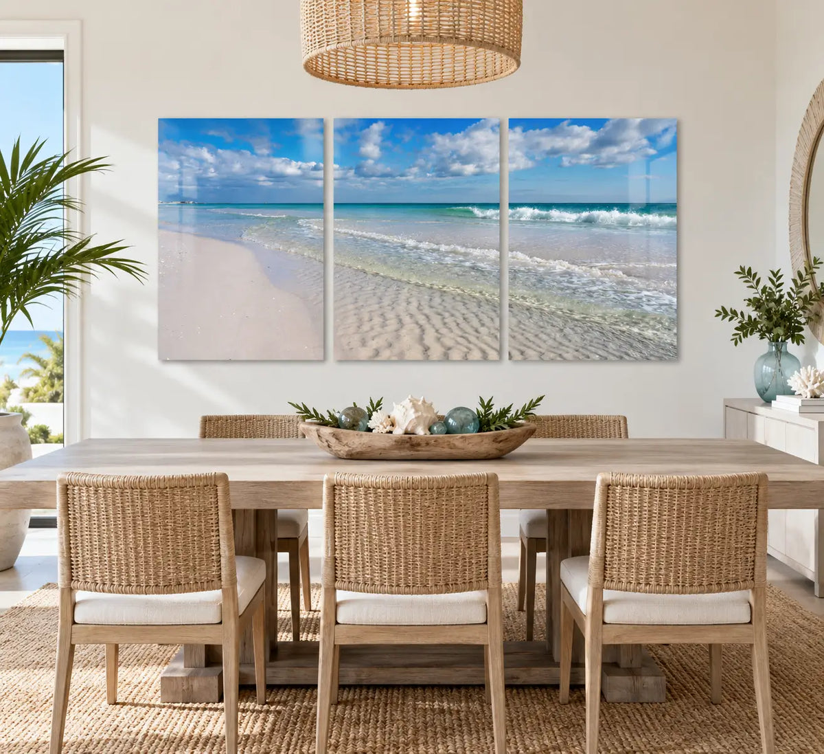 Crystal Clear Beach Triptych Glass Print displayed above a dining table in a bright modern coastal dining room