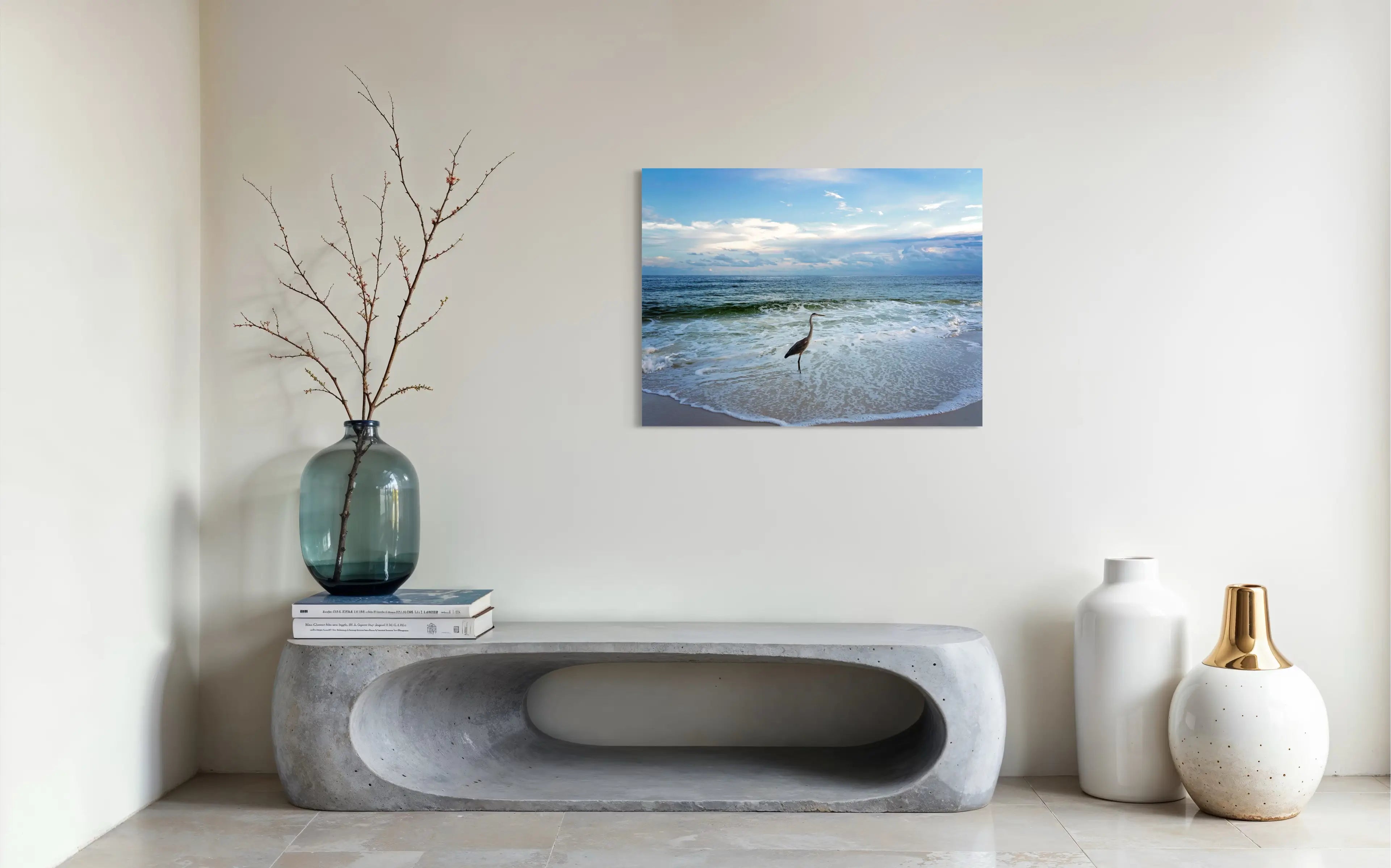 Heron on shoreline under cloudy sky, coastal glass art, modern ocean wall art