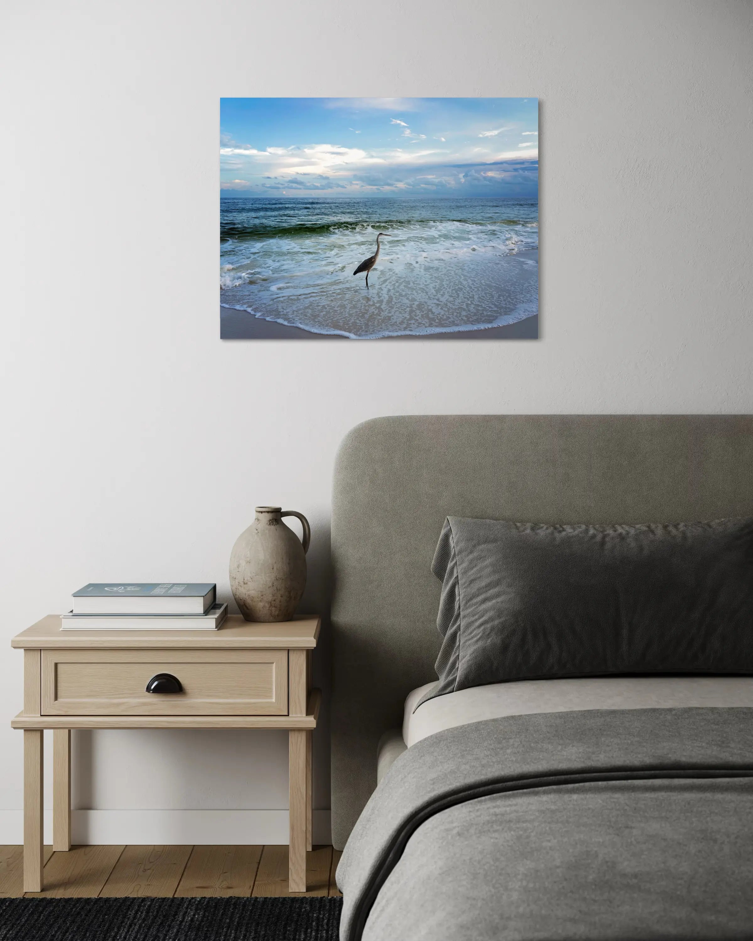 Heron on shoreline under cloudy sky, coastal glass art, bedroom ocean wall art