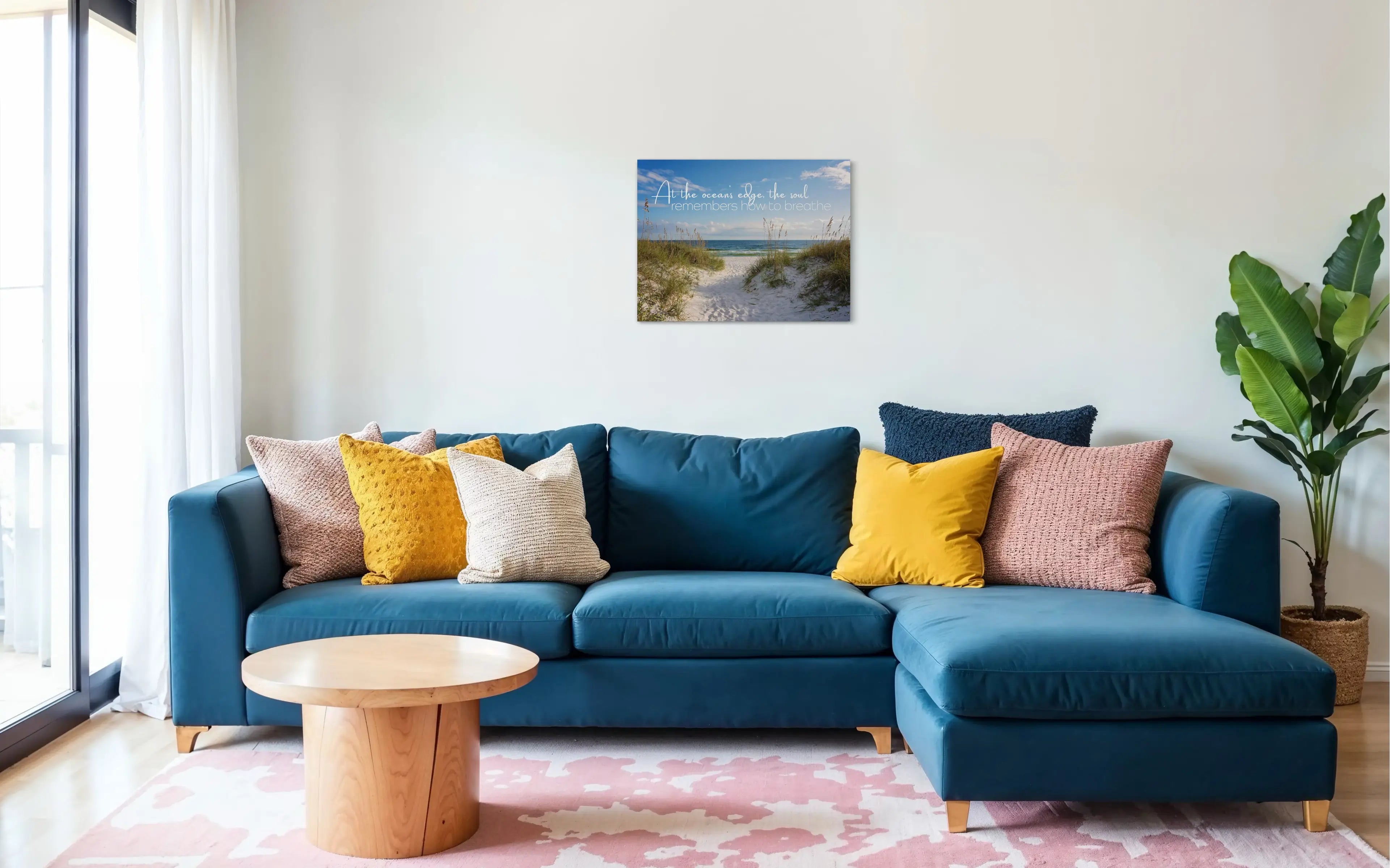 Coastal glass print with inspirational quote: At the ocean’s edge, the soul remembers how to breathe. Sand dunes and sea oats in coastal living room