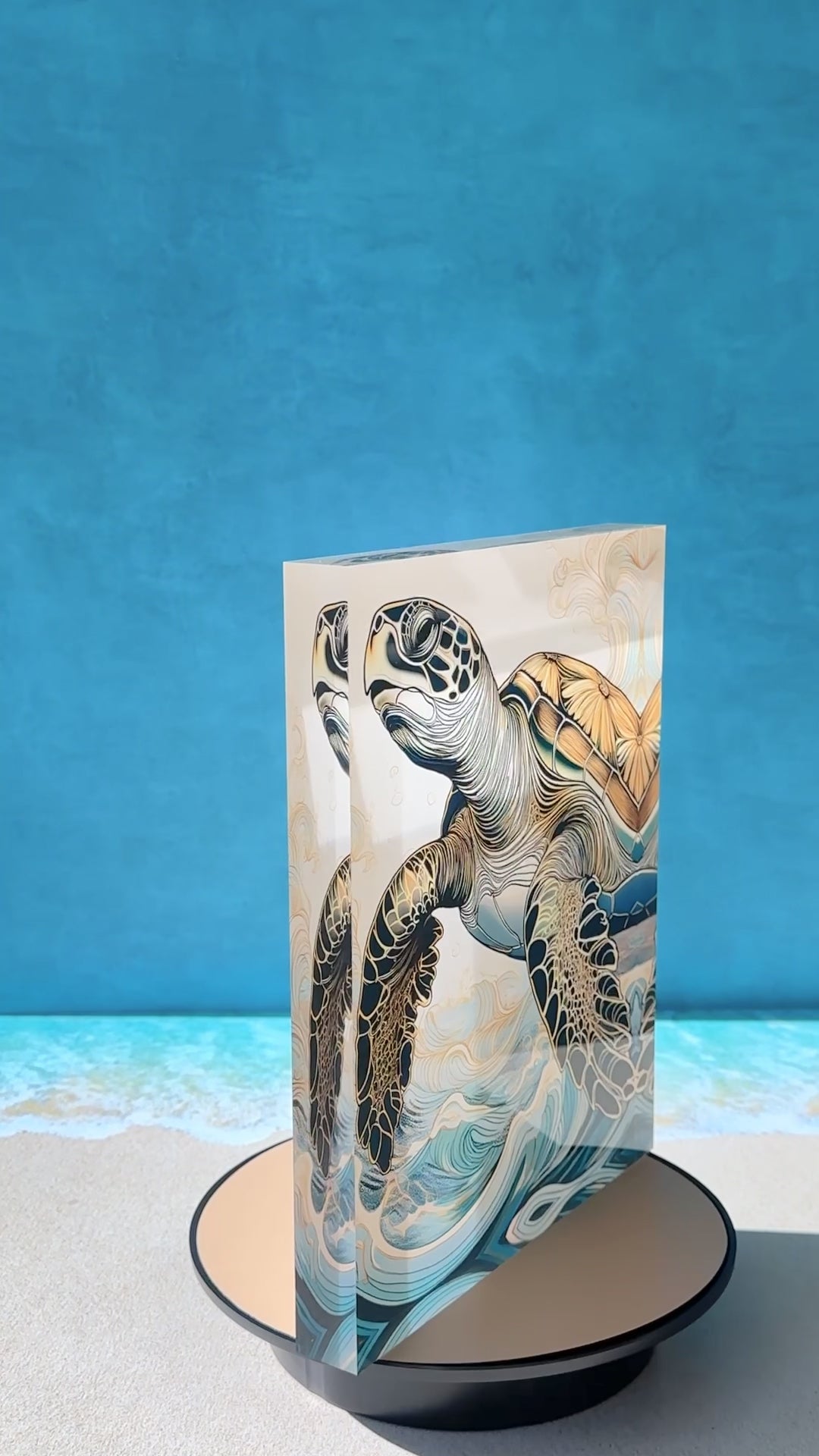 Video of whimsical sea turtle swimming in the waves on acrylic block print