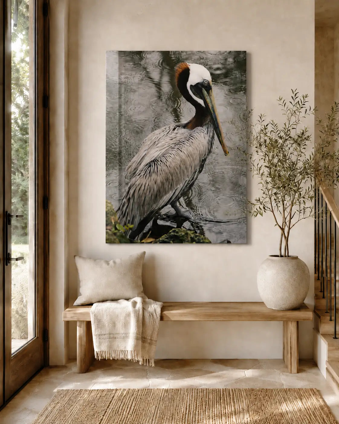 Coastal entryway with warm tones and a large pelican glass print 