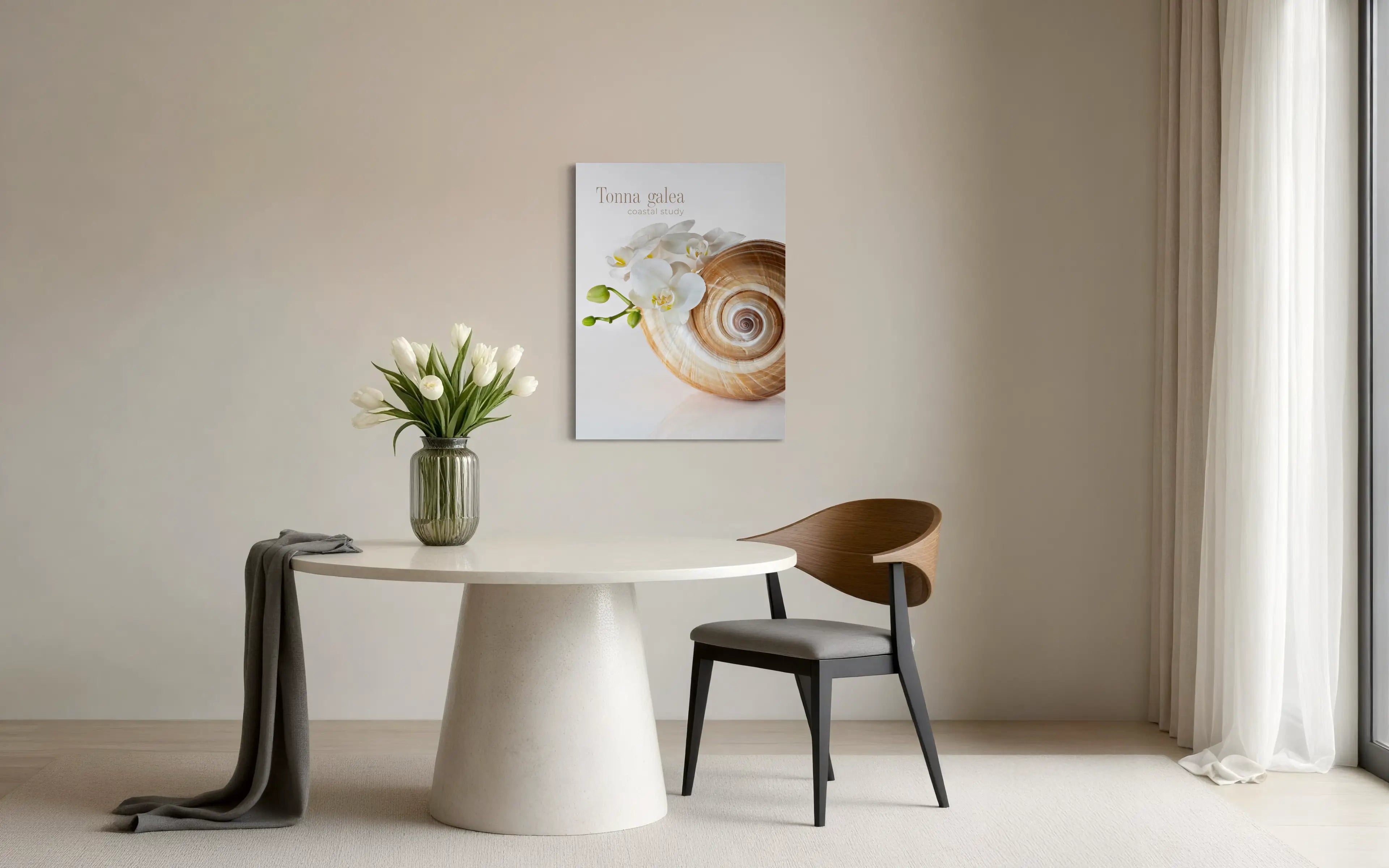 Coastal interior with tonna shell and white orchid wall art on glass, styled above a table with soft neutral decor.